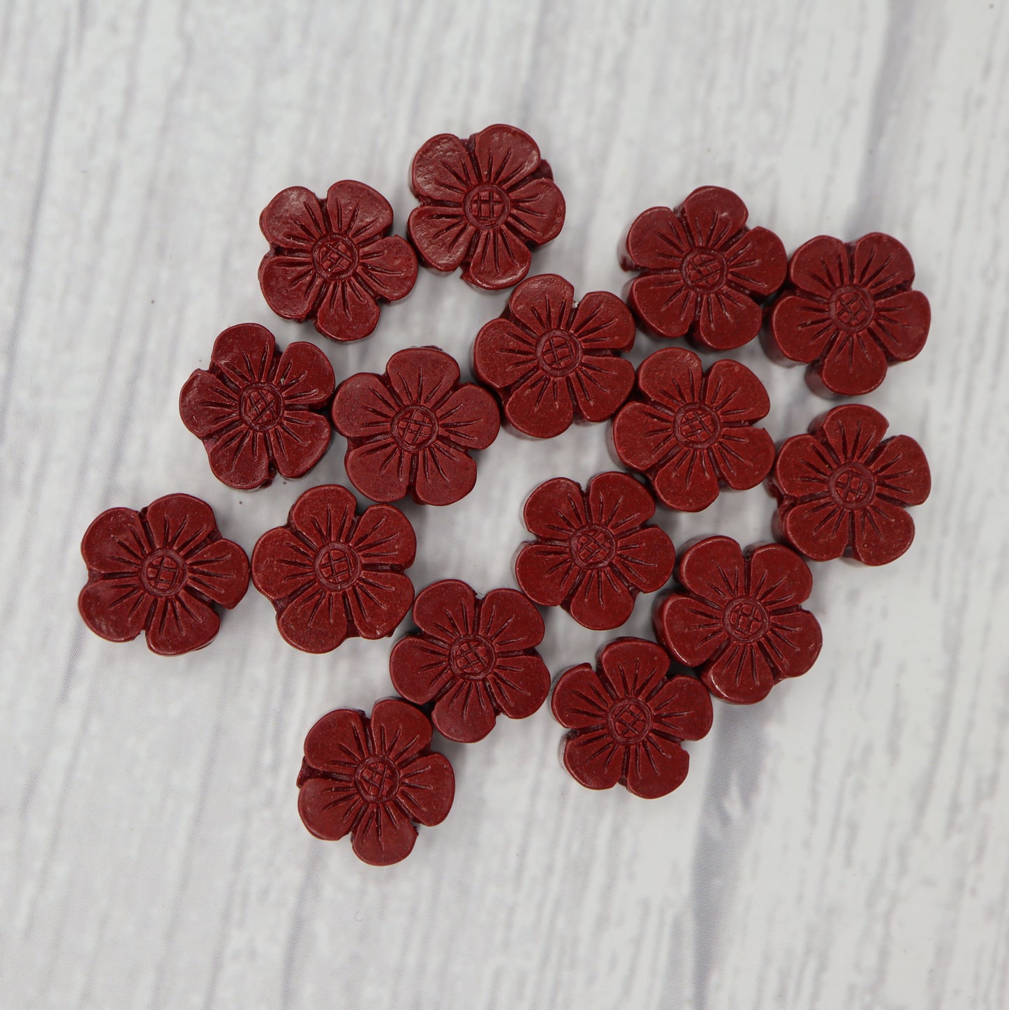 Cinnabar Flower Charm